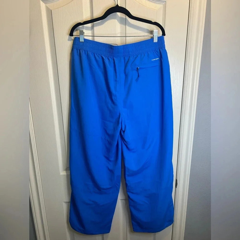 💦”North Face” NWT Women’s Blue Nylon Easy Wind Pant Flashdry w/ Pockets Size L💙 - Picture 4 of 16